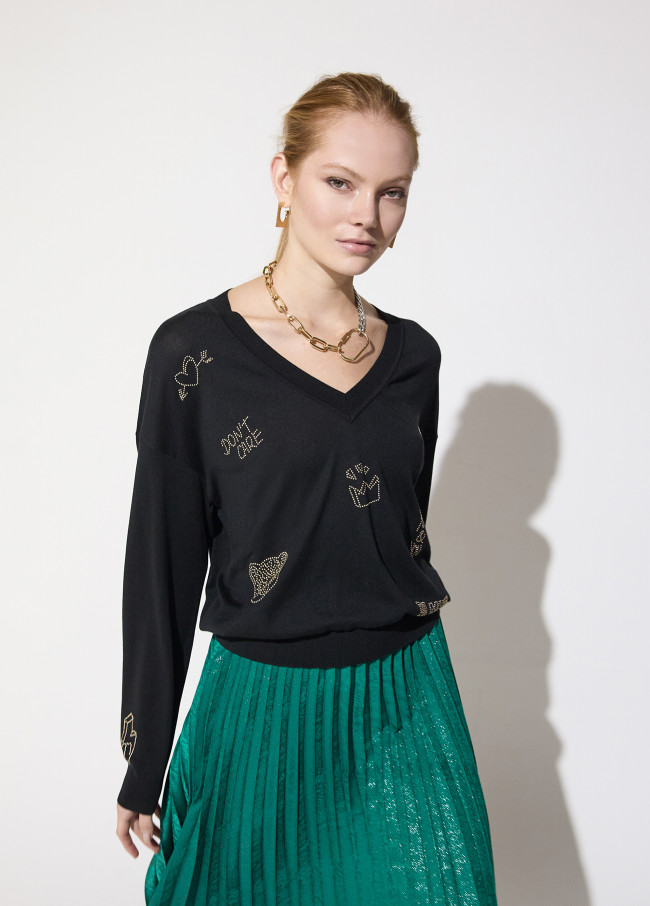 SUETER NEGRO MOTIVOS STRASS ORO